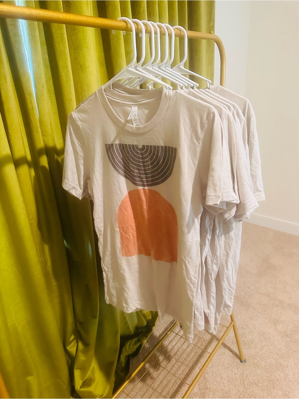 Graphic White Tee with Abstract Peach and Charcoal Design